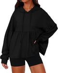 Solid color hooded top with large ruffled sleeves